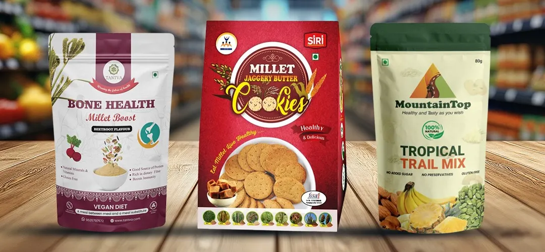 Millet Boost health mix, millet jaggery butter cookies and tropical trail mix on a store counter